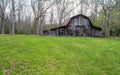 Rustic Old Barn in the Woods Ã¢â¬â Virginia, USA Royalty Free Stock Photo